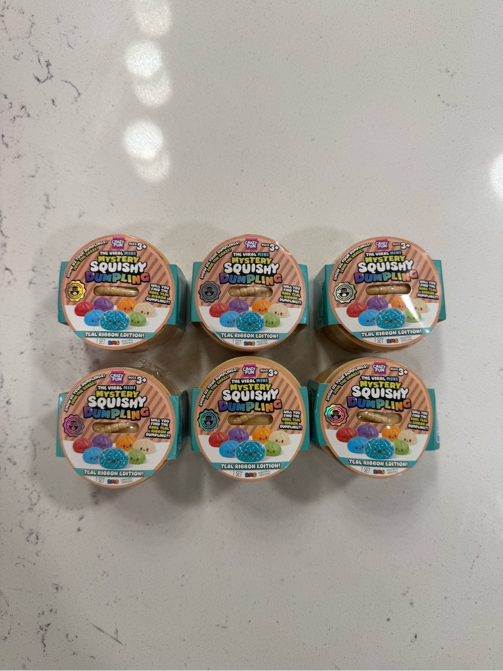 The viral MINI mystery squishy Dumpling teal ribbon edition Bundle ! Set of 6